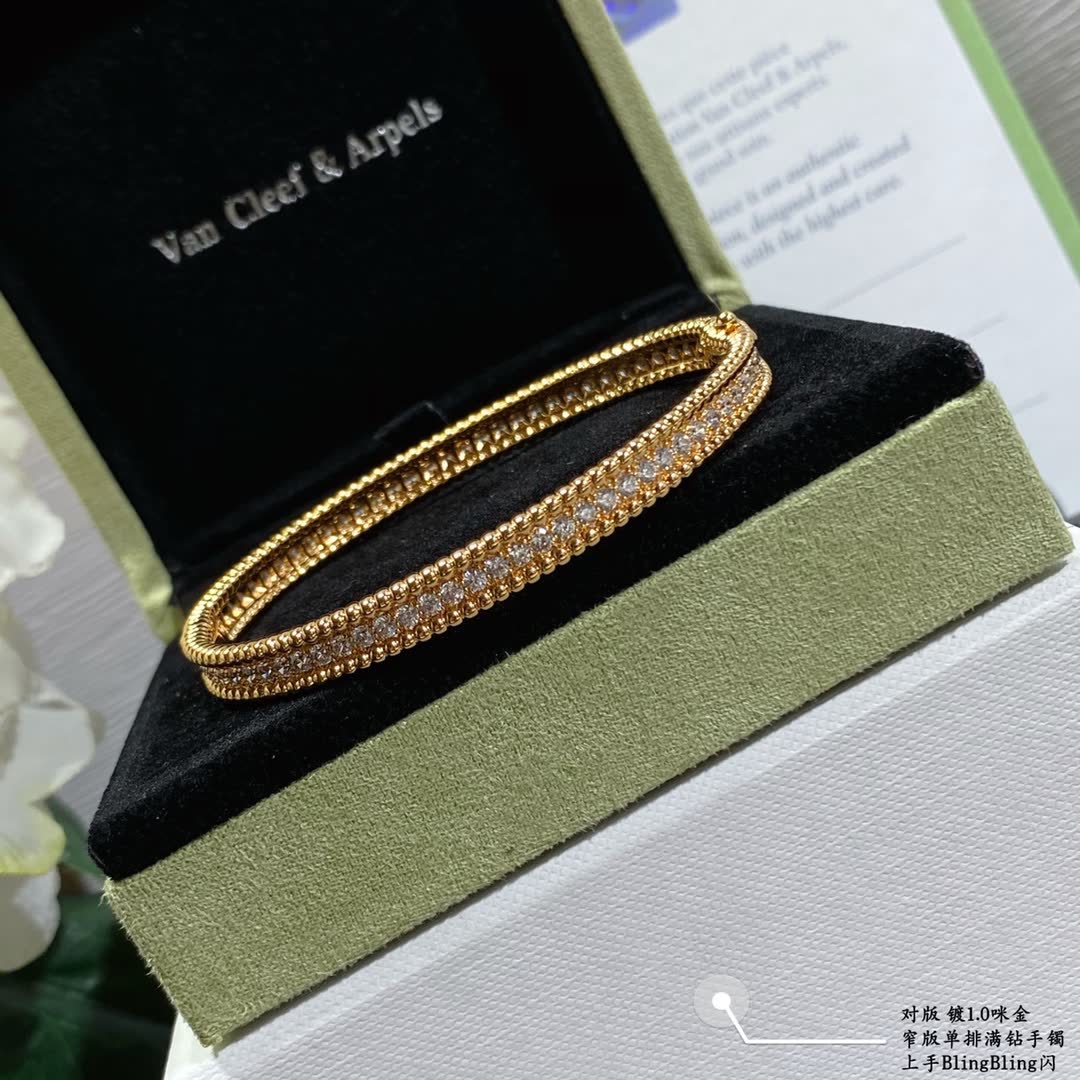 Van Cleef & Arpels Silver Diamante Flower Bangle Set